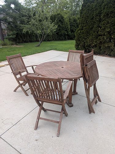 Toys, books, clothes, games, and kitchen! Teak patio set! photo