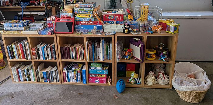 Toys, books, clothes, games, and kitchen! Teak patio set! photo