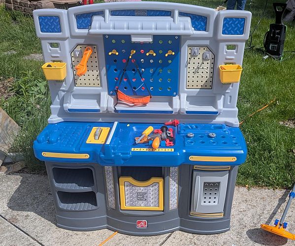 Toys, books, clothes, games, and kitchen! Teak patio set! photo