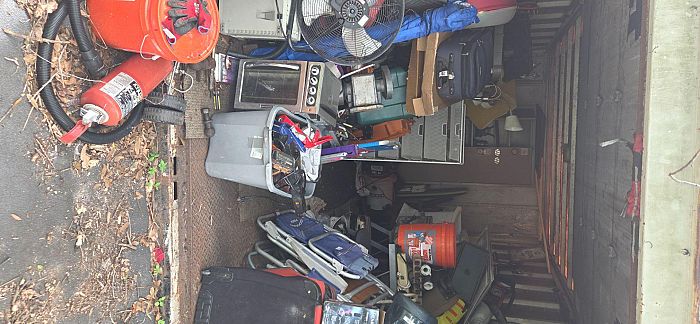Moving sale in back yard photo