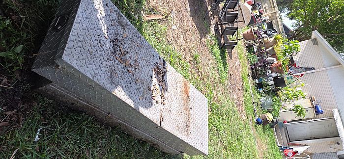 Moving sale in back yard photo