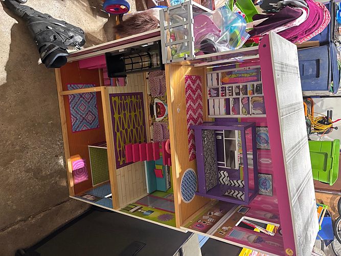 Tons of kid toys and books photo