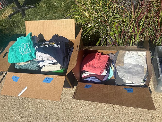 Yard sale between two houses cover