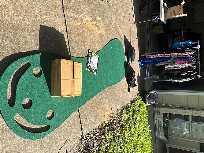 Fish tank, golf matt, kitchen ware, clothes, and more! photo